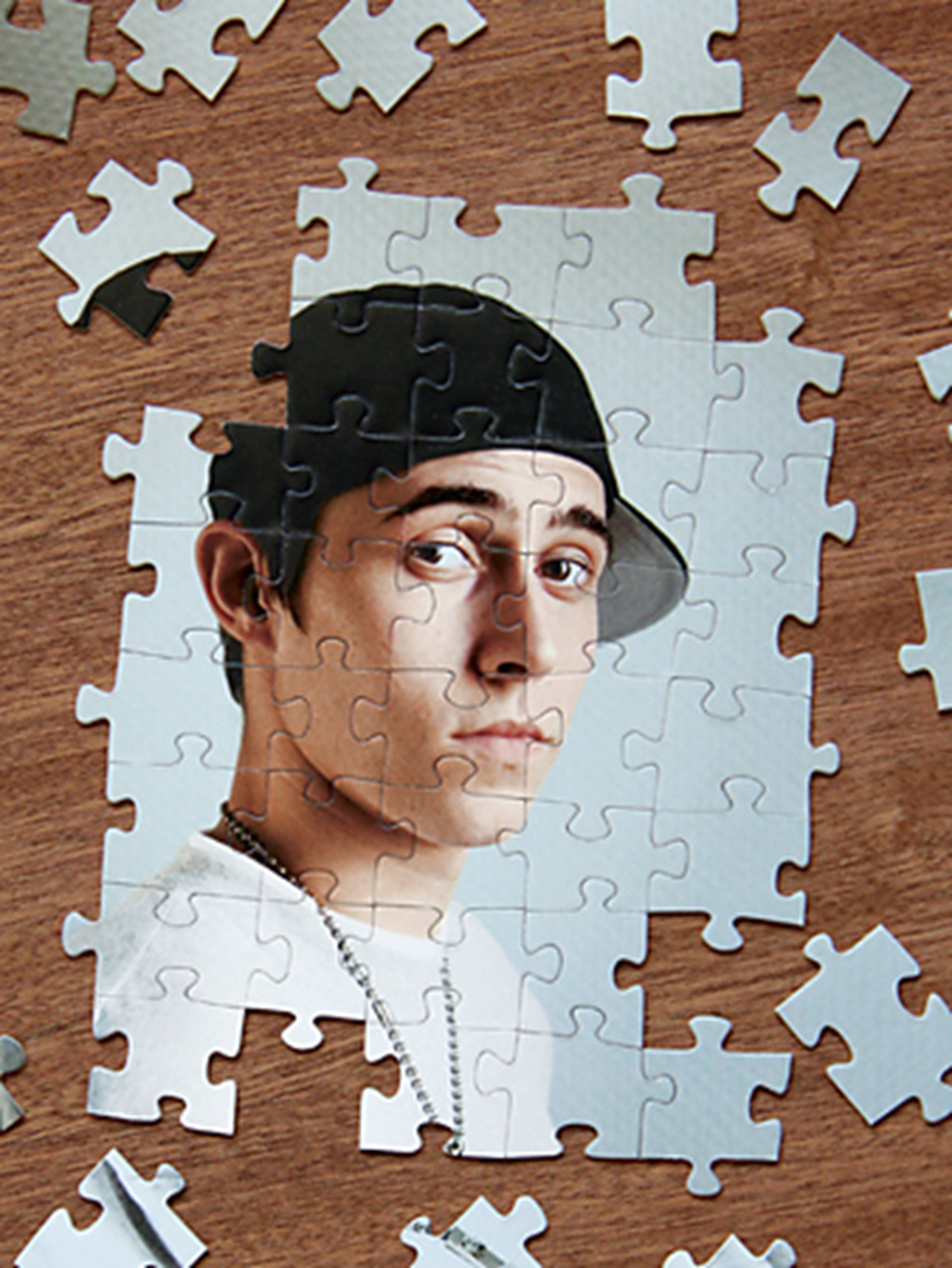 Jungengesicht als Puzzle